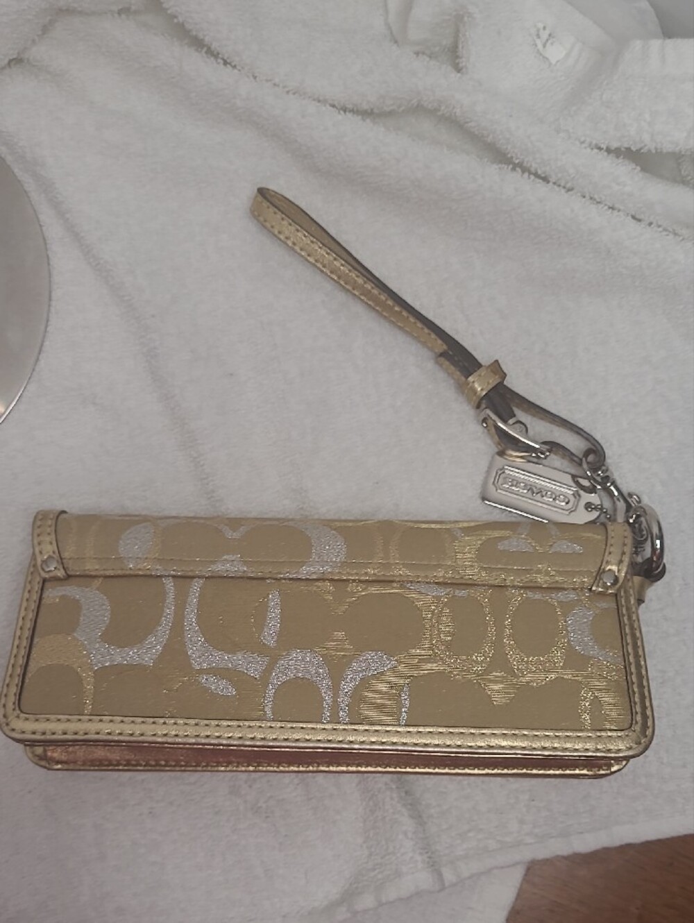 COACH Gold Metallic Signature Turnlock Wristlet - Picture 4 of 10